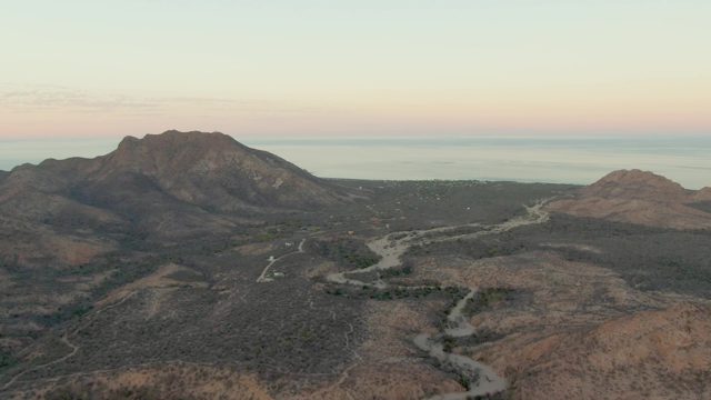 Car Traveling on Winding Mountain Road
