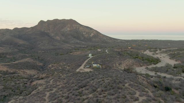 Desert Landscape with Mountain and Small Structure