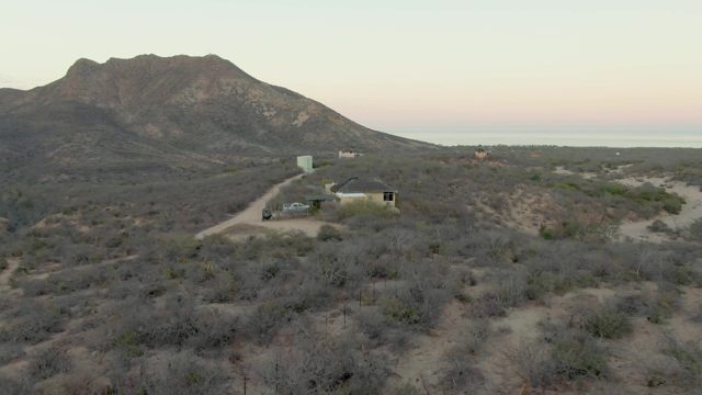 Desert House with Mountain Backdrop