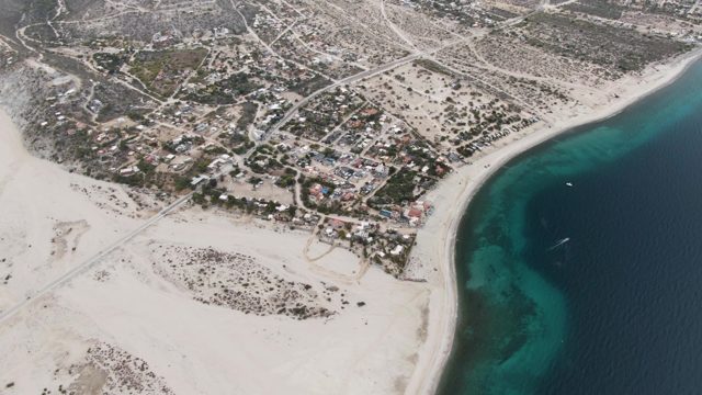 Coastal Residential Area and Sandy Beach From Above