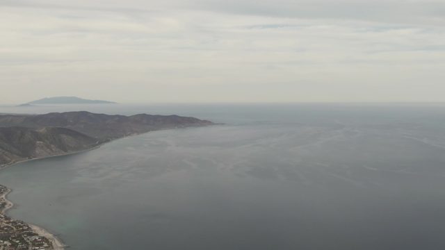 Coastal Town and Ocean in Aerial View