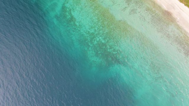Beach and Ocean Transition From Shore to Deep Water