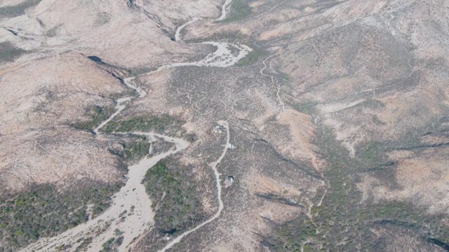 Winding River Through Arid Hillscape