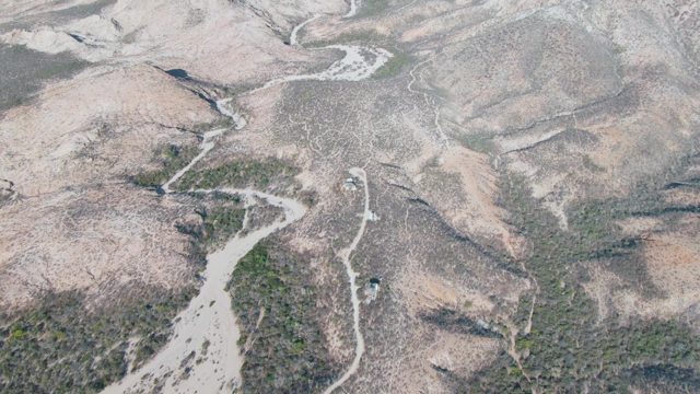 Vehicle Moving on Winding Mountain Road