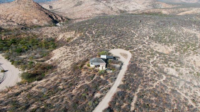 Small Building in Arid Hilly Desert Terrain