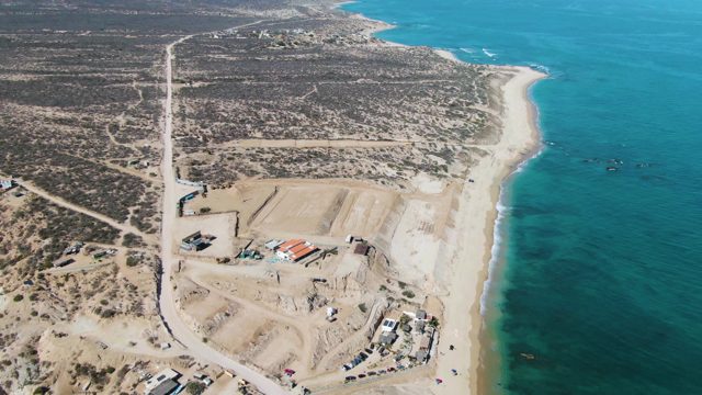 Coastal Construction Site with Moving Equipment