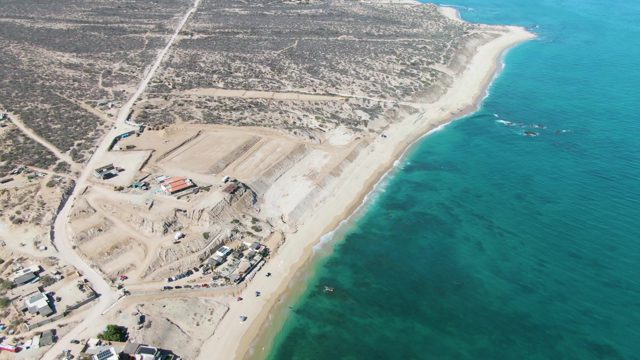 Coastal Construction Site with Vehicle Movement