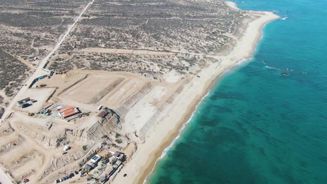 Coastal Construction Site Along Sandy Shore