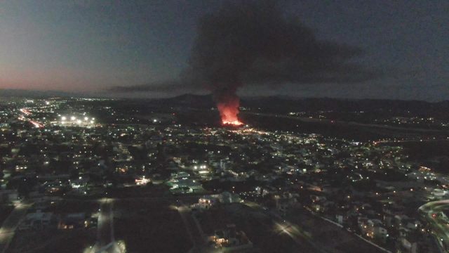City Fire at Dusk Aerial View