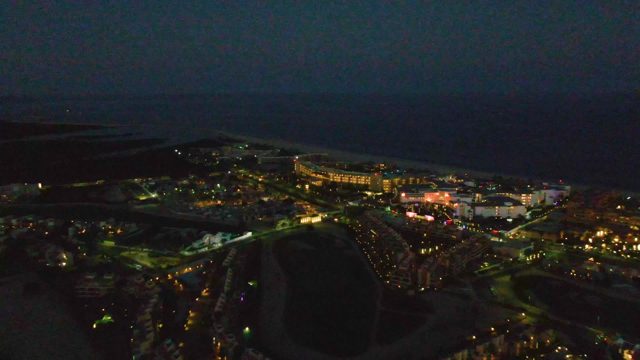 Coastal Town Lights Fading at Night