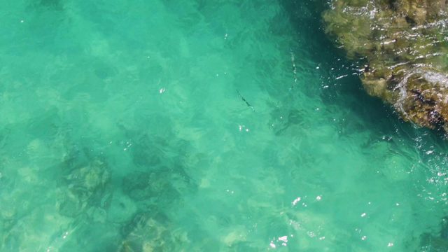 Clear Turquoise Water and Rocky Seabed