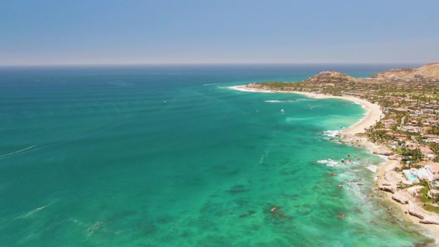 Gentle Ocean Waves Lapping a Sandy Coastal Shore