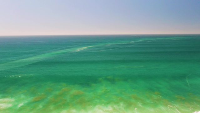 Calm Turquoise Ocean with Visible Shallow Seabed