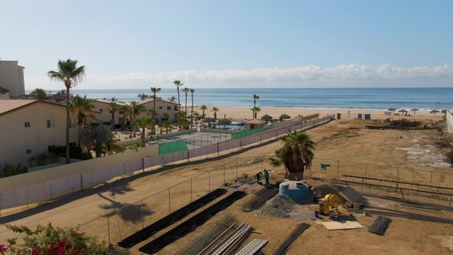 Beachside Construction with Tarp Erection