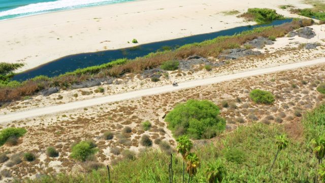 SAN JOSE DEL CABO BCS MEXICO-2020: Vehicle Moving on Coastal Road by Sandy Beach
