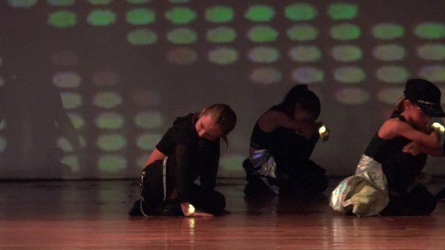 SAN JOSE DEL CABO BCS MEXICO-2023: Three Dancers Performing Synchronized Choreography on Stage