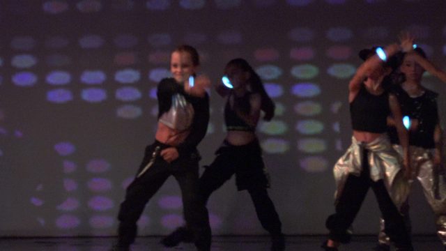 SAN JOSE DEL CABO BCS MEXICO-2023: Dancers Performing Synchronized Routine with Glowing Lights