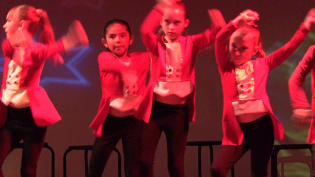 SAN JOSE DEL CABO BCS MEXICO-2023: Children in Red Jackets Synchronized Dance Performance