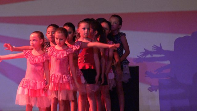 SAN JOSE DEL CABO BCS MEXICO-2023: Young Girls Performing a Synchronized Dance Routine on Stage