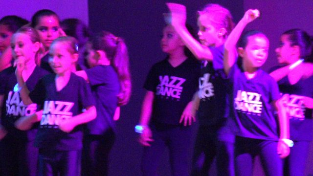 SAN JOSE DEL CABO BCS MEXICO-2023: Children Performing Jazz Dance Routine in Colored Lighting