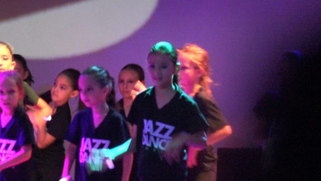 SAN JOSE DEL CABO BCS MEXICO-2023: Jazz Dance Group Performing with Glow Sticks on Stage