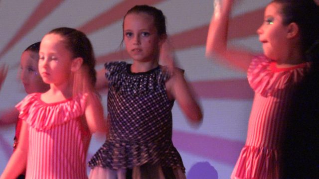 SAN JOSE DEL CABO BCS MEXICO-2023: Young Girls Performing Synchronized Dance Routine on Stage