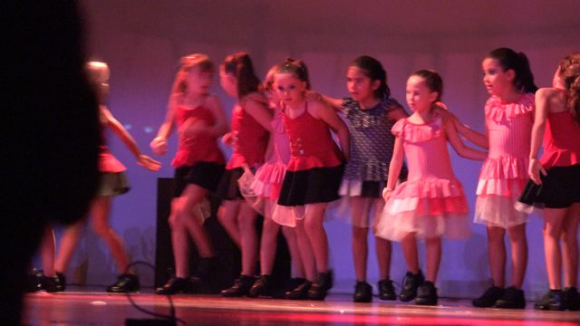 SAN JOSE DEL CABO BCS MEXICO-2023: Young Girls Performing Synchronized Dance Routine on Stage