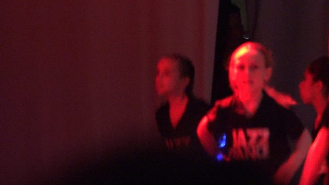 SAN JOSE DEL CABO BCS MEXICO-2023: Children Performing Jazz Dance in Colored Stage Lighting