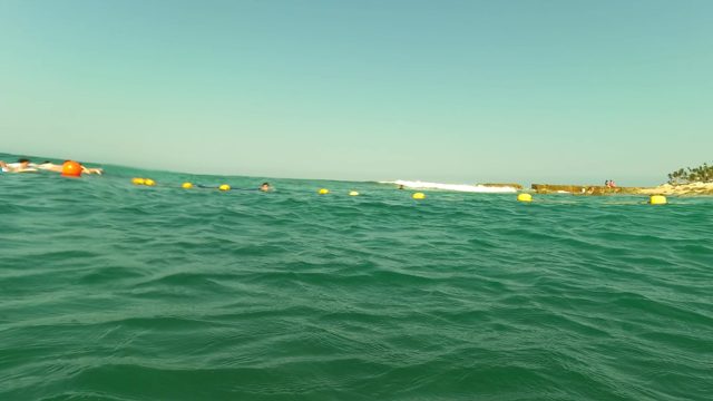 LOS BARIELLES BCS MEXICO-2023: People Swimming in the Ocean Near Buoys