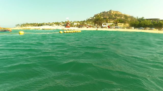 LOS BARIELLES BCS MEXICO-2023: Swimmer Dives Into Ocean and Submerges Underwater