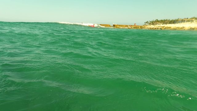 LOS BARIELLES BCS MEXICO-2023: Gentle Ocean Waves Approaching a Sandy Beach