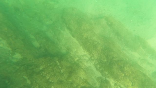LOS BARIELLES BCS MEXICO-2023: Underwater View of Rocky Riverbed with Water Movement