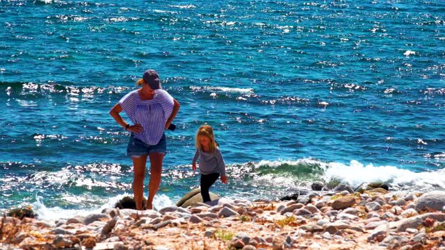 EL SARGENTO LA VENTANA MEXICO-2020: Adult and Child Interacting on Rocky Beach