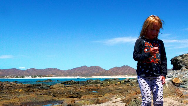 EL SARGENTO LA VENTANA MEXICO-2020: Child Walking on Rocky Coastal Shore