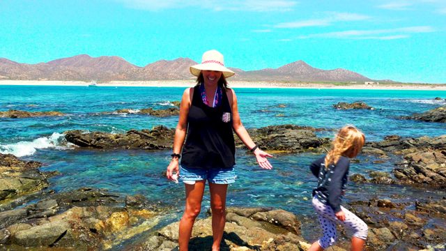 EL SARGENTO LA VENTANA MEXICO-2020: Woman and Child Walking on Rocky Beach Shore