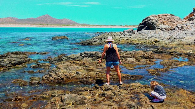 EL SARGENTO LA VENTANA MEXICO-2020: Woman and Child Exploring Rocky Shoreline