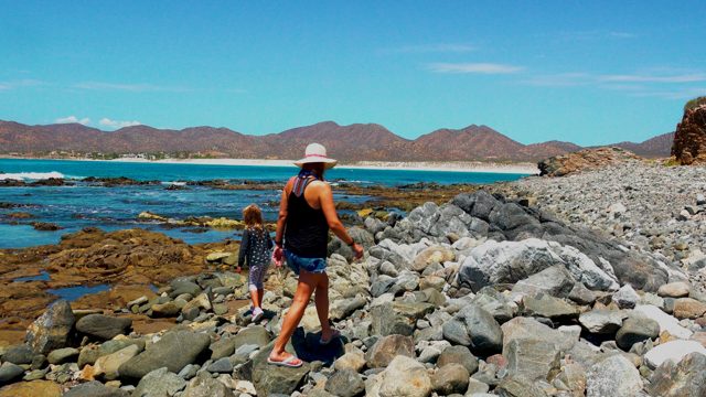 EL SARGENTO LA VENTANA MEXICO-2020: Woman and Child Walking on Rocky Shore
