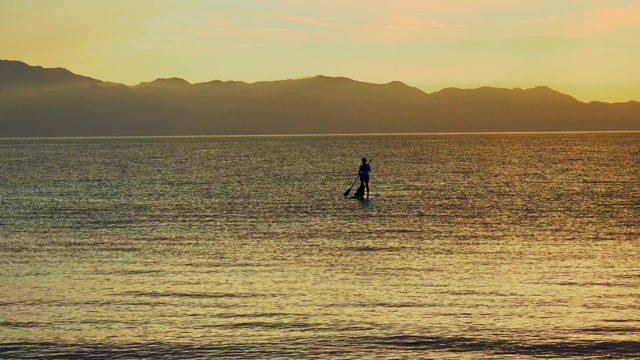 EL SARGENTO LA VENTANA MEXICO-2020: Paddleboarder Gliding on Calm Waters at Sunset