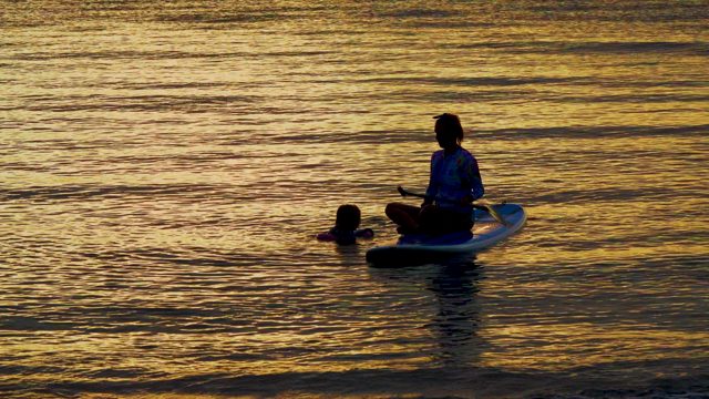 EL SARGENTO LA VENTANA MEXICO-2020: Paddleboarder and Swimmer in Sunset Waters