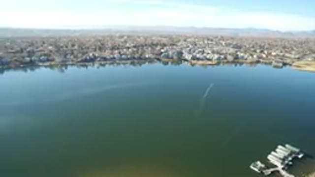 WESTMINSTER COLORADO-2016: Aerial View Of A Large Lake With Green Water And A