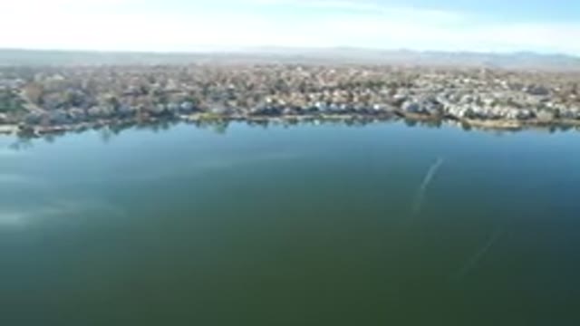WESTMINSTER COLORADO-2016: Air Footage Of A Town At The Shore Of A Big And Beautiful Lake