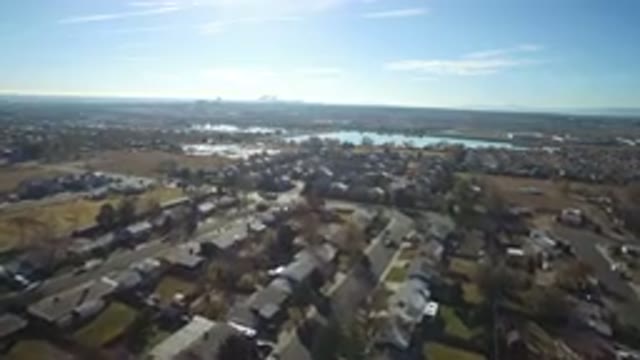 WESTMINSTER COLORADO-2016: Overhead Footage Of A Large Town Near A Big Body Of Water