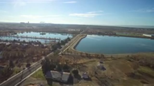 WESTMINSTER COLORADO-2016: Drone Footage Over Town Lake Road Traffic Trees