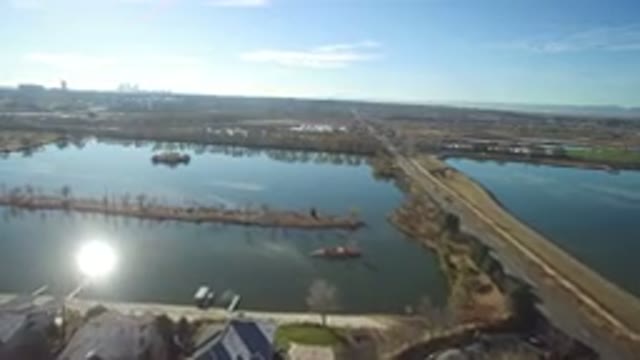 WESTMINSTER COLORADO-2016: Long Road Crossing Through Light Blue Water