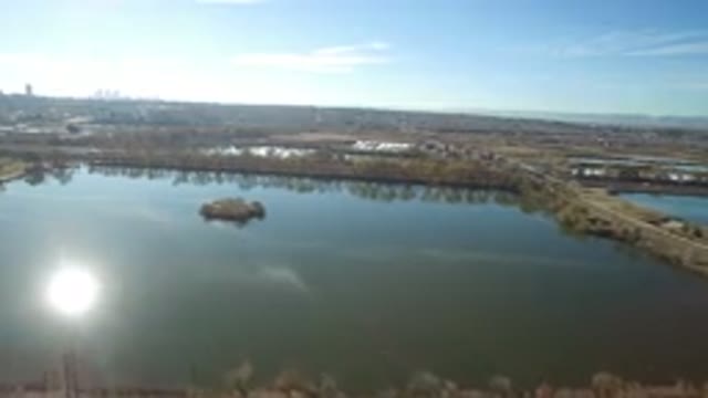 WESTMINSTER COLORADO-2016: Aerial Footage Of A Large Body Of Water Surrounded By