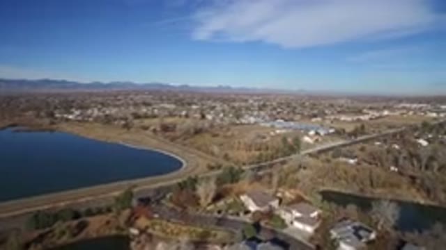 WESTMINSTER COLORADO-2016: Overhead View Of Artificial Lake By Road And Buildings