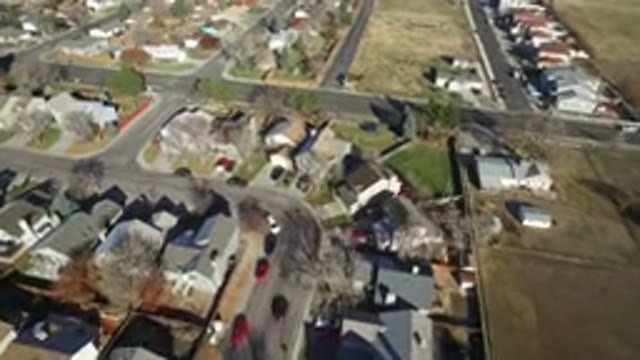 WESTMINSTER COLORADO-2016: Residential Street With Houses And Passing Cars