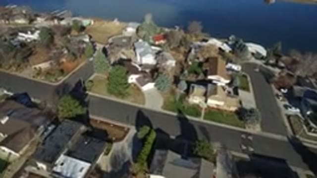 WESTMINSTER COLORADO-2016: Aerial View Of Homes Along Coastline Of Water