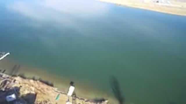 WESTMINSTER COLORADO-2016: A Serene Beach With Golden Sand and Blue Water