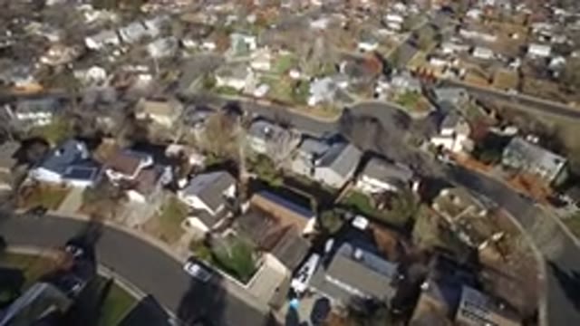 WESTMINSTER COLORADO-2016: Small Houses Between Roads with Vehicle Parked Aside